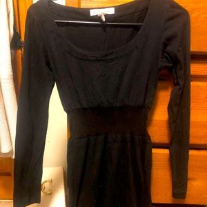 Black knee length BCBG dress! Size XS! Sheer mid-drift!
